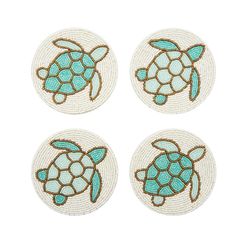 four coasters with sea turtle designs on them