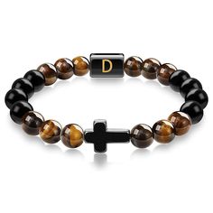 "This Item is Handmade" Enhance your spiritual journey with our Cross Tiger Eye Bracelet with Initial Charm. This exquisite piece is crafted from high-quality Tiger Eye stones, known for their protective and grounding properties. The beaded bracelet features a stylish cross pendant and a customizable initial letter, making it a perfect personalized bracelet for both men and women. Each handmade bracelet is meticulously designed to bring you good luck and protection. The durable elastic cord ensu Adjustable Spiritual Bracelet With Polished Beads, Adjustable Spiritual Crystal Bracelet With Polished Beads, Personalized Adjustable Spiritual Rosary Bracelet, Adjustable Spiritual Gemstone Beads Wristband, Adjustable Personalized Spiritual Rosary Bracelet, Adjustable Healing Bracelets With Polished Beads, Spiritual 8mm Beaded Wristband Bracelet, Spiritual 8mm Beads Wristband Bracelet, Adjustable Symbolic Gemstone Beaded Bracelets