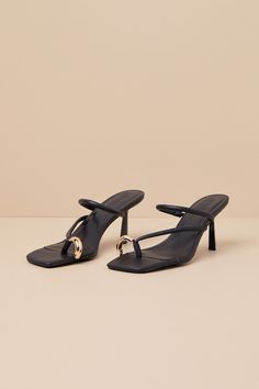 We hope you like compliments because everyone will love you in the Billini Camren Black Strappy High Heel Slide Sandals! These luxe heels have a smooth faux leather construction that shapes a trendy square footbed and an open-toe upper. The thong-style upper features a toe loop adorned with an oversized, oblong gold metal accent, followed by a strappy vamp (with elastic at the side of one strap for fit). Effortless slide-on design sits atop a flirty spool heel. Available in whole sizes only. 3" spool heel. Cushioned insole. Rubber sole has nonskid markings. Man Made Materials. Imported. Lulus | Camren Black Strappy High Heel Slide Sandal Heels | Size 7. Black Strappy High Heels, Strappy High Heels, Spool Heel, Sandal Heels, Black Sandals Heels, Metallic Accents, Strappy Heels, Slide Sandals, High Heel