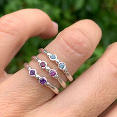 Wear them on their own or stacked all the way up your finger, our gemstone stacking bands in reclaimed sterling silver are the perfect addition to your daily jewels, a perfect gift for a loved one or yourself. Available in Ruby, Rhodolite Garnet, London Blue Topaz, Peridot, Amethyst, Blue Zircon, Spessartite Garnet, and Moonstone and mixed (pick your own stones) Each Stone measures approx 2.5mm. These beautiful pieces are handmade to order in Emily's Hudson Valley studio. Please allow 14-21 busi