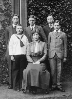 an old black and white photo of a group of people