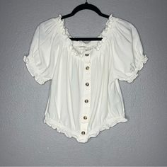 - H&M - Good Condition - Women’s Size M - Very Stretchy - Has Buttons - Extra Button Included With Inside Tag - Smoke Free Home Chic H&m Blouse With Buttons, Chic H&m Blouse With Button Closure, Fitted H&m Blouse With Buttons, Trendy Button-up Blouse From H&m, Trendy Button-up H&m Blouse, Trendy Button-up Blouse By H&m, Fitted Ruffle Blouse From H&m, Fitted Ruffle Blouse H&m, Fitted Ruffled Blouse By H&m