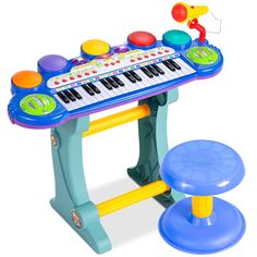 a toy musical keyboard and stool on a white background