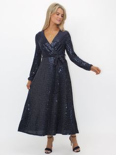 Elegant midi dress adorned with shimmering sparkles Includes a stylish tie belt to accentuate the waist Midi length for a sophisticated, timeless look Perfect for parties, evening events, or special occasions Combines comfort and glamour for a standout ensemble Flattering silhouette ensures you shine with confidence