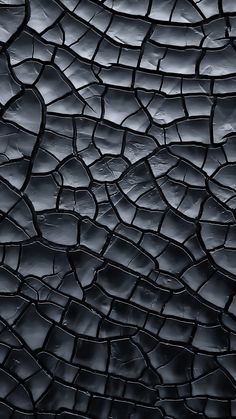 an abstract black and white photograph of some kind of rock pattern that looks like it has been made out of rocks