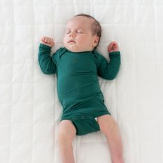 Our bamboo bodysuits are an essential piece for every mini wardrobe. Silky smooth and perfectly stretchy, these bodysuits work as both a standalone outfit or coordinating piece with any other Kyte Baby product. 97% Bamboo Rayon, 3% Spandex Breathable material Designed for sensitive skin Snap closures Fold over cuffs to prevent scratching on sizes preemie, newborn and 0-3 months Available in preemie size to fit babies 4-7 lbs Cotton Long Sleeve Onesie For Sleep, Unisex Long Sleeve Onesie For Loungewear, Long Sleeve Green Sleepwear For Playwear, Fitted Long Sleeve Onesie For Playtime, Solid Long Sleeve Onesie For Playwear, Solid Color Long Sleeve Onesie For Playwear, Fitted Long Sleeve Bodysuit For Playtime, Long Sleeve Bodysuit For Playwear, Solid Color Long Sleeve Bodysuit For Playwear