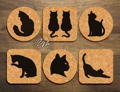 six coasters with cats silhouettes on them