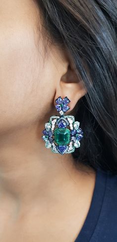 All of the products are MADE TO ORDER in India. They are handcrafted by me and my expert artisan team. *Gemstone Grade: AAAAA (Natural Diamond Coated) *Base Metal: 925 Sterling Silver *Plating: White Gold Plated *Gemstone: Emerald, Blue Sapphire          SKU : AAER_DE_106 *PLEASE NOTE* *   This product is completely eco-friendly and non-aggressive to all skin type.  *   It does NOT contain nickel, cadmium, or lead. Find more amazing products like Rings, Earrings, Necklace, Brooches, Bracelets, T Formal Multi-stone Fine Jewelry Earrings, Sterling Silver Multi-stone Jewelry For Evening, Sterling Silver Multi-stone Evening Jewelry, Evening Multi-stone Sterling Silver Jewelry, Formal Multi-stone Drop Earrings, Party Jewelry In White Gold With Multi-stones, Exquisite Multi-stone Jewelry For Evening, Exquisite Multi-stone Evening Jewelry, Formal Multi-stone Diamond Earrings