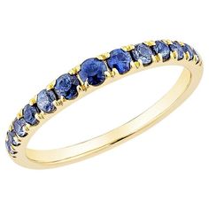 Elevate your jewelry collection with this stunning stackable ring, featuring a vibrant blue sapphire set in luxurious 14K yellow gold. The deep hue of the sapphire beautifully contrasts with the sparkling diamond accents that gracefully surround it, adding a touch of elegance and brilliance. Blue Sapphire Stackable Ring in 14Karat Yellow Gold. Blue Sapphire: 0.05 carat, 1.60mm size, round shape. Blue Sapphire: 0.06 carat, 1.70mm size, round shape. Blue Sapphire: 0.07 carat, 1.80mm size, round sh Yellow Gold Diamond Ring With Tanzanite In Prong Setting, Tanzanite Sapphire Ring With Prong Setting, Fine Jewelry Yellow Gold Sapphire Ring With Accent Stones, Classic Stackable Sapphire Rings In Yellow Gold, Classic Stackable Sapphire Diamond Ring, Blue Sapphire Stackable Birthstone Ring, Yellow Gold Tanzanite Sapphire Ring With Accent Stones, Brilliant Cut Sapphire Rings In Yellow Gold, Yellow Gold Sapphire Ring With Tanzanite And Accent Stones