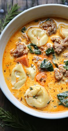 Sausage Tortellini Soup with Spinach in a white bowl. Tortellini Soup With Spinach, Creamy Sausage Tortellini Soup, Creamy Sausage Tortellini, Italian Sausage Tortellini, Italian Sausage Tortellini Soup, Soup With Spinach, Spinach Tortellini Soup, Sausage Tortellini Soup