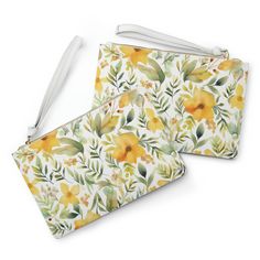 Hey there fashionista! Do you want a clutch that's not only stylish but also practical? Introducing our Yellow Floral Pattern Clutch Bag, perfect for you on-the-go gals! This clutch is designed with a loop handle to free up your hands, so you can focus on enjoying your day without worrying about carrying a bag. You'll love its saffiano pattern finish made of cruelty-free vegan leather. This means that you can be fashionable without sacrificing your values. Don't be fooled by its compact size, th Spring Zipper Pouch Wristlet Clutch, Travel Clutch Pouch For Spring, Spring Zipper Pouch Wallet, Spring Clutch With Detachable Handle, Spring Clutch With Removable Pouch, Spring Clutch Bag With Zipper Closure, Spring Clutch Wallet With Removable Pouch, Spring Travel Wristlet Pouch, Spring Zipper Pouch Wristlet For Daily Use