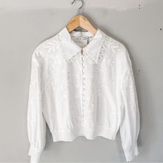 Slightly Cropped Off White Blouse With Embroidered Flower Motif, Cute Button Front, Ruched Cuffs. New With Tags, No Flaws. Size Xl. Measurements Included In Photos. Smoke Free Home. Olivia White, White Blouse, Alice Olivia, Embroidered Flowers, New Color, Top Blouse, Off White, Womens Tops, White