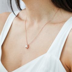 The meaning of "Halo Au Lait" is "Halo with Milk" in French, reflecting the essence of the necklace. The drop-shaped stone is expertly crafted to resemble a drop of milk, capturing the sacrifice of motherhood. Its unique shape also adds deep symbolism to the necklace, reminding us of the life-giving nature of breastmilk. Minimalist White Pendant Birthstone Necklace, Delicate Teardrop Jewelry For Her, Delicate Oval Pendant Necklace For Her, Delicate Teardrop Jewelry As Gift For Her, Delicate Oval Pendant Necklace As Gift For Her, Minimalist Teardrop Gemstone Jewelry, Elegant Drop-shaped Keepsake Necklaces, Elegant Drop Necklaces For Keepsakes, Elegant Drop Keepsake Necklaces