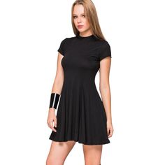 Features: By: Kikiriki Style: High Neck Short Sleeve Mini Shift Dress Neckline: High Closure: Pullover 53648 Year Round Size: Womens S Condition: New With Tags Black Stretch Mini Dress With Short Sleeves, Black Casual Mini Dress For Night Out, Black Stretch Knee-length Mini Dress, Casual Black A-line Mini Dress, Black Fit And Flare Mini Dress For Spring, Black Fit And Flare Dress With Short Sleeves, Casual Black Dress For Night Out, Black A-line Stretch Mini Dress, Casual A-line Mini Dress For Night Out