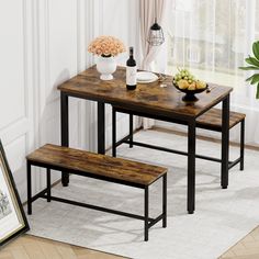 a table with two benches and a bowl of fruit on the table next to it