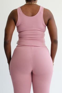 Details : Nylon spandex tank top. Styling : Pair it with our "DIA" pants or "IKA" mini skirt. Fit : Super stretch. Un-lined. True to size. Made in : the USA. 90% Nylon 10% Spandex Model is : wearing a s/m Fitted Pink Tank Top With Built-in Bra, Pink High Stretch Crop Top With Built-in Bra, Pink Crop Top With Built-in Bra And High Stretch, Pink Fitted Crop Top With Built-in Bra, Pink Sleeveless Elastane Activewear, Pink Sleeveless Tank Top, Fitted Pink Tank Crop Top, Stretch Pink Tops With Built-in Bra, Fitted Pink Activewear With Built-in Shorts