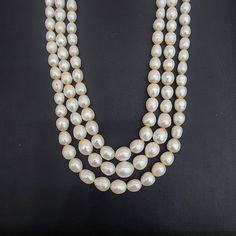 Enhance your style with this Three-Strand Pearl Necklace, featuring lustrous pearls in a classic layered design. Ideal for both formal and everyday wear, this piece adds a touch of timeless elegance to any ensemble. Material : Natural pearls & adjustable thread