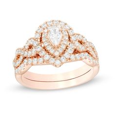 A graceful choice, this diamond bridal set complements her modern style. Fashioned in 14K rose gold, the enchanting engagement ring showcases a 1/4 ct. pear-shaped diamond wrapped in a pair of diamond-lined frames. The twist ribbons of the split shank glisten with diamonds. On your wedding day, the contoured diamond-lined band completes her look. Captivating with 1 ct. t.w. of diamonds and a bright polished shine, this bridal set honors your unique love. Rose Gold Diamond Ring Zales, Center Stone Engagement Ring, Zales Engagement Rings, Twisted Ribbons, Double Frame, Diamond Wedding Sets, Diamond Bridal Sets, Buying Diamonds, Stone Engagement Rings