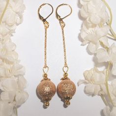 This Gorgeous Beaded Earring Set Is Brand New Nwt & Handmade By Me - Wvluckygirl. Done With Glittery Golden Beads And Antiqued Gold Toned Costume Jewelry Beads. They Have A Stiff Bar Stick That Has Little Cuts In It That Sparkle In The Light. The Pair Dangle & Drop From Lever Backs For Women's Pierced Ears. 2 7/8 Inches Tall & 1/2 Inch Wide. Each Single Earring Weighs 2.1 Grams. Lightweight! The Perfect Fashion Accessory To Glam Up Your Look. Buy It Now Before Someone Else Does! Dangly Dangling Nickel-free Round Beads Party Jewelry, Gold Dangle Beaded Earrings For Evening, Adjustable Beaded Chain Earrings For Party, Gold Elegant Beaded Earrings For Evening, Elegant Adjustable Beaded Earrings With Beaded Chain, Elegant Beaded Chain Dangle Earrings, Elegant Adjustable Beaded Earrings, Gold Nickel-free Beaded Earrings For Party, Dangle Jewelry With Gold Beads For Party