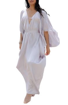 Perfect for poolside hangs or kicking it in the sand, this tie-front kaftan is the perfect accessory to add to your sun-loving wardrobe. V-neck
 Short sleeves 100% polyester satin Hand wash, line dry
 Imported Model stats: 5'10", 32" bust, 25" waist, 36" hip. Model is wearing size One Size. Bohemian V-neck Tie Waist Cover-up, Chic Spring Unlined Cover-up, Chic V-neck Summer Kimono, Chic Unlined Spring Cover-up, Chic Summer Wrap Cover-up, Flowy V-neck Kaftan For Day Out, Flowy V-neck Kimono For Day Out, V-neck Summer Kaftan For Vacation, Spring V-neck Kaftan For Beachwear