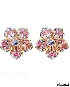 pair of pink and blue flower shaped earrings with crystal stones on each earpieces