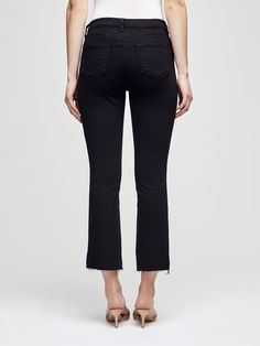 An essential cropped jean with an effortless, relaxed fit in saturated black. High-rise, five-pocket design is cut from premium stretch denim that holds its shape while providing supreme comfort. Slim straight leg gently drapes to a raw hem. Chic Black Cropped Jeans For Spring, Mid-rise Black Cropped Jeans With Five Pockets, Black Mid-rise Cropped Jeans With Five Pockets, Mid-rise Black Pants With Frayed Hem, Black Relaxed Fit Cropped Jeans For Fall, Black Cropped Jeans With Relaxed Fit For Fall, Black Relaxed Fit Mid-rise Cropped Jeans, Black Mid-rise Relaxed Fit Cropped Jeans, Trendy Black Cropped Jeans With Frayed Hem