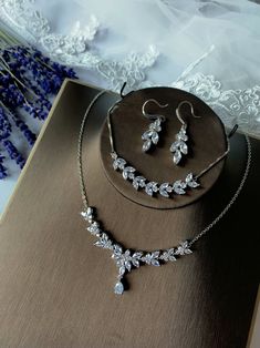 This romantic yet classy jewelry set is suitable for bride, bridesmaid or maid of honor. Elegant and easy to match. Wonderful for engagement party, anniversary, evening events, date night, graduation ceremony, mothers gift, baby shower, minimalist wedding or any special occasions etc. Want another combination or color? send me a message! ♥Lead and nickel free ♥Made from shinny and high-quality cubic zirconia crystal  ♥Timeless design ♥Extra long chain available ♡JEWELRY DETAILS♡ 【Earrings】 Size Elegant Jewelry Sets With Matching Earrings For Bridesmaids, Delicate Wedding Jewelry Sets With Matching Earrings, Silver Jewelry Sets For Bridesmaids, Elegant Bridal Sets With Matching Earrings For Wedding, Elegant Bridal Sets With Matching Earrings, Elegant Jewelry Sets For Bridesmaids, Elegant Silver Bridal Accessories For Bridesmaids, Baby Shower Minimalist, Shower Minimalist