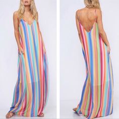 Beautiful And Unique Maxi Dress! Easy To Care For Flowy Material That Makes For A Flattering Summer Fun Look. 100% Polyester Machine Wash Cold/Dry Flat Lined For Additional Coverage To Knees Fabric Is Flowy With No Stretch Length From Shoulder To Hem On Hanger 60” Bust 20” From Bottom Of Arm Pit To Arm Pit 40”Across Middle Never Worn! New Without Tags Multicolor V-neck Beach Dress For Day Out, Striped Maxi Dress For Beach Cover-up, Colorful V-neck Dress For Day Out, Striped V-neck Maxi Dress For Beach Season, Colorful Chic Maxi Dress For Spring, Chic Colorful Maxi Dress For Spring, Chic Multicolor Maxi Dress For Beach Cover-up, Striped V-neck Maxi Dress For Vacation, Striped Maxi Sundress