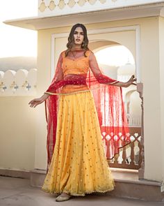 Yellow Red Lehenga Set - www.riafashions.com Bollywood Style Anarkali Set For Diwali Festive, Traditional Palazzo Set With Sheer Dupatta For Celebration, Floor-length Gota Work Sharara For Festive Occasions, Festive Floor-length Sharara With Gota Work, Festive Gota Work Floor-length Sharara, Anarkali Sharara For Celebration During Navratri, Festive Anarkali Palazzo Set For Festivals, Palazzo Set With Sheer Dupatta For Celebrations And Festivals, Festive Palazzo Set With Sheer Dupatta For Celebration