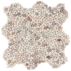 a large group of small rocks on a white background, arranged in the shape of a map