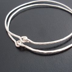 Ancient Times - Hammered Silver Bangle Bracelets, Two Hammered Silver Bracelets, Hand forged Metal Jewelry, Hand Crafted Silver Jewelry Silver Sliding Knot Bangle Bracelets, Silver Sliding Knot Bangle Bracelet, Silver Bangle Bracelet With Sliding Knot, Handmade Silver Wrap Bracelet For Friendship, Handmade Adjustable Minimalist Bangle, Silver Hand Wrapped Bracelets For Friendship, Silver Braided Bangle Bracelet For Friendship, Handmade Silver Friendship Bracelet, Handmade Silver Bracelet For Friendship