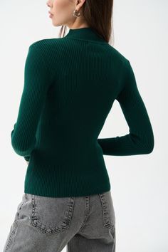 A timeless classic that suits everyone—this ribbed turtleneck with a mock neck is a versatile wardrobe staple. The soft ribbed knit provides warmth and comfort even in cold weather, while beautifully accentuating the silhouette. The mock neck and extended sleeves add a cozy and stylish touch to any outfit. For busy days, pair it with jeans or tailored pieces in neutral shades like black, white, beige, or gray. For special occasions, try combining this turtleneck with a satin skirt—we guarantee y Chic Turtleneck With Ribbed High Neck, Winter Knit Mock Neck Top, Winter Knit High Neck Mock Neck Top, Winter High Neck Knit Mock Neck Top, Winter Turtleneck Mock Neck Top, Fall Knit Mock Neck Turtleneck Top, Knit Turtleneck Mock Neck Top For Fall, Fitted Knit Turtleneck With Ribbed Collar, Elegant Fitted Turtleneck With Ribbed Neckline