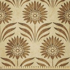 a brown and white flower pattern on fabric with a ruler in front of the image