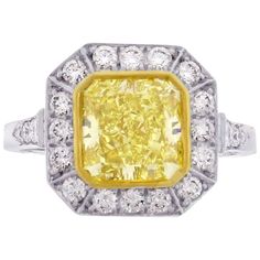 Pampillonia Diamond, Yellow Diamond Canary Ring Yellow Diamond Ring With Center Stone, Yellow Emerald Cut Diamond Ring With Halo Setting, Yellow Cushion Cut Diamond Ring With Halo Setting, Yellow Cushion Cut Diamond Ring With Center Stone, Yellow Platinum Diamond Ring, Dazzling Yellow Brilliant Cut Diamond Ring, Yellow Platinum Diamond Ring Fine Jewelry, Dazzling Yellow Rings With Halo Setting, Dazzling Brilliant Cut Yellow Diamond Ring