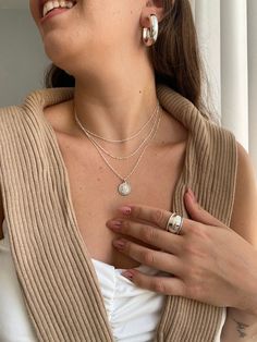 "Welcome to my store! I invite you to enjoy our massive holiday gift sale!! Up to 20% off + free worldwide shipping!! A very delicate Silver coin necklace with tiny silver dots chain is the perfect necklace for an upgraded daily look. A perfect memory of Queen Elizabeth, whose face is stamped on the coin, Our necklace made of 100% sterling silver !! ♦ Measurements ♦ Necklace length: 16.93\" (43 cm) + extra extension 1.2\" (3 cm), The silver coin diameter is 0.67\" (1.7 cm). -------------------------------------------------------------- ♦♦ SPECIAL OFFER ♦♦  Coin necklace + Two-layer necklace -  Purchase a perfect set of two necklaces (3 layers) and get a special price! -------------------------------------------------------------- ♦ Two-layer basic necklace: A stunning basic necklace made u Delicate Coin Pendant Jewelry, Delicate Coin Pendant Necklace, Delicate Round Coin Pendant Jewelry, Sterling Silver Medallion Necklace With Pearl Pendant, Silver Coin Pendant Necklace For Everyday, Everyday Silver Necklace With Coin Pendant, Everyday Delicate Round Coin Necklace, Sterling Silver Round Coin Necklace, Silver Coin Necklace With Clavicle Chain