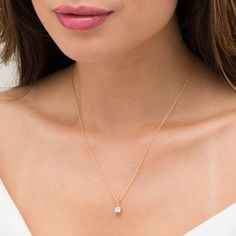 Complete any look in sparkling style with this effortless diamond pendant. Crafted in warm 10K gold, this tailored choice showcases a scintillating 1/2 ct. princess-cut diamond solitaire. Polished to a bright shine, this pendant suspends along an 18.0-inch rope chain that secures with a spring-ring clasp. Wedding Fine Jewelry Solitaire Baguette-cut Necklace, Gold Solitaire Necklace With Emerald-cut Diamond Accents, Gold Solitaire Necklace With Emerald Cut Diamond Accents, Elegant Baguette Cut Solitaire Necklace For Wedding, Emerald Cut Cubic Zirconia Solitaire Necklace For Wedding, Gold Radiant Cut Diamond Necklace, Baguette Cut Solitaire Necklace For Wedding, Elegant Emerald Cut Solitaire Necklace For Wedding, Emerald Cut Gold Solitaire Necklace