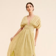 Yellow Maxi Dress Wedding, Spring V-neck Mini Dress For Cocktail, Spring Evening Midi Dress With Ruched Details, Spring Midi Dress For Cocktail Events, Spring Midi Dress For Cocktail Occasions, Dressy Midi Dress For Spring Cocktail, Spring Cocktail Midi Dress, Spring Party Knee-length Maxi Dress, Flowy Evening Dress For Spring