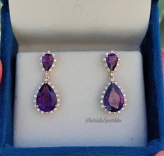 Natural amethyst earring With natural diamond High quality Amethyst With High Quality Diamond Earrings This special Piece of jewelry made by nature Amethyst and natural Diamond we used 4 pieces of natural Amethyst and pieces 54pc Details are below.... Features: *Material - 14k gold (if 18k gold needed please inquire) *gold color - white Gold (if yellow gold needed please inquire) Amethyst DETAILS.. *Gems Stone - Amethyst *Secondary Stone - Diamond *Amethyst Stone Cut- Pear *Number of Amethyst - Purple Diamond Earrings For Gift, Amethyst Earring, Hanging Earring, Amethyst Color, Hanging Earrings, Amethyst Earrings, Amethyst Stone, Angelina Jolie, Diamond Sizes