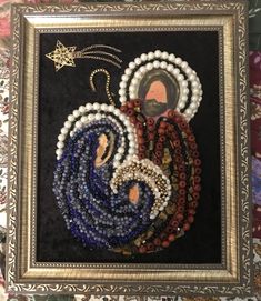 an art work with beads and pearls on it