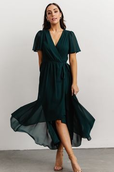 Dark Green Elegant Ruffle Dress, Elegant Dark Green Ruffled Dress, Elegant Dark Green Dress With Ruffles, Elegant Chiffon Wrap Dress With Short Sleeves, Elegant Chiffon Short Sleeve Wrap Dress, Green Flutter Sleeve Evening Dress, Flowy Chiffon Wrap Dress For Party, Green Fitted Dress With Draped Sleeves, Chic Green Maxi Dress With Draped Sleeves