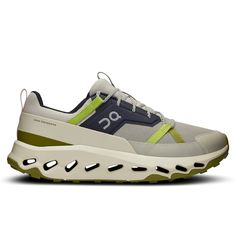 the on cloud sneaker in grey and lime green is shown from the front view