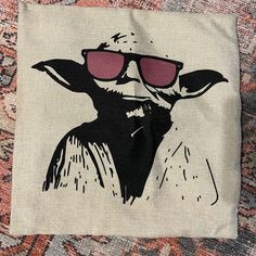 a bag with a drawing of a bird wearing sunglasses