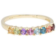 Brighten up your day (and your look!) with the rainbow of color provided by this dazzling gemstone band ring. From Ariva. Colorful Promise Rings, Rainbow Engagement Ring, Colorful Wedding Band, Multicolor Wedding, Pretty Engagement Rings, Future Engagement Rings, Orange Sapphire, Rock Candy, Colorful Wedding