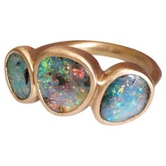 Dalben design One of a kind 18 kt rose gold ring with three bezel-set blue-green-pink Australian Boulder Opals weight 4,34 carats . Ring size US 7 1/4 - EU 55 re-sizable . Bezels setting dimension: max width 23 mm, max height 10, mm. The ring has been designed and handcrafted in our atelier in Italy Como with a rigorous quality workmanship . Opal Rose Gold Ring, Rose Gold Opal Ring, Boulder Opal Ring, Australian Boulder Opal, Boulder Opal, Opal Rings, Cocktail Rings, Bezel Setting, Bouldering