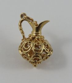 "This is a vintage \"Reticulated Jug\" 14 karat gold charm for a charm bracelet. It weighs 3.75 grams and measures 5/8\" x 7/8\", marked \"14K\" All charms come with a split ring to attach to a bracelet. We have hundreds of charms in stock. If you don't see what you are looking for in our shop please contact us as it is likely we have it. Inventory #G3218" African Map, Split Rings, Small Rings, Split Ring, Gold Charm, A Bracelet, 10k Gold, Vintage Charms, Heart Charm