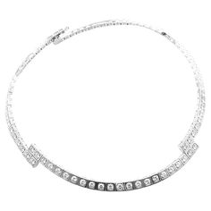 18k White Gold Diamond Tectonique Tennis Necklace by Cartier. With 85 Round Brilliant Cut Diamonds VVS1clarity, E color total weight approximately 13.6ct Details: Length: 17" Width: from 11mm to 6mm Weight: 38.6 grams Stamped Hallmarks: Cartier 750 836XXX(serial number omitted) YOUR PRICE: $65,000 T3195toedd Luxury Timeless Cartier Necklaces, Classic Cartier Luxury Necklace, Cartier Cubic Zirconia Jewelry With Brilliant Cut, Elegant Cartier Diamond Necklace With Brilliant Cut, Elegant Cartier Brilliant Cut Diamond Necklace, Classic Cartier Jewelry With Diamond Accents, Timeless Cartier Jewelry With 17 Jewels, Formal Cartier Diamond Necklace With Accents, Cartier Cubic Zirconia Round Cut Jewelry