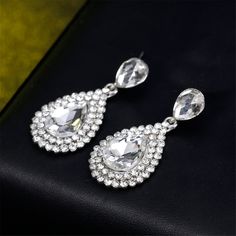 Level up looks with luxurious style by donning these earrings enriched with glittering cubic zirconia stonework. 0.75'' W x 1.57'' L Silver-plated copper / cubic zirconia /?crystal Silver Earrings Wedding, Bridal Earring, Wedding Dress Jewelry, Crystal Earrings Wedding, Bridal Wedding Earrings, Crystal Bridal Earrings, Silver Diamond Earrings, Bridal Earrings Drop, Earring Wedding