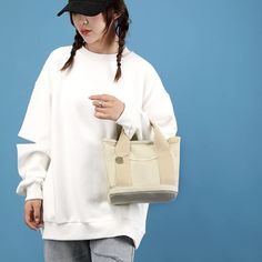 〖Simple Japanese style〗 The plain canvas material is matched with a retro version, with a strong Japanese style, which can be used as a daily bag with various clothes, simple and versatile 〖Daily Size〗The size is 9*8.3*6in, which can accommodate daily items such as A4 books, MINI tablets, mobile phones, small cosmetic bags, wallets, etc. Hardware zipper, smooth opening and closing, regular stitching 〖Fine workmanship〗 This hobo handbag is made of thick and durable high-density canvas, which is w Casual Canvas School Bag In Solid Color, Trendy Cream Canvas Bag For School, Casual Solid Color Canvas Bag For School, Casual Solid Color Canvas School Bag, Casual Beige Bags For Daily Use, Trendy Solid Color Shoulder Canvas Bag, Trendy Beige Canvas Bag, Trendy Solid Color Canvas Bag For School, Trendy Beige Canvas Bag With Double Handle