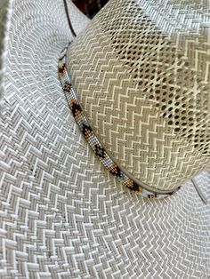 "1/4\" wide All bead work is beaded with 10lb extreme braided nylon line. All hat bands are finished at 23\" with glued than sewed down leather ends and an adjustable leather tie." Cowboy Hat Bands, Beaded Hat Bands, Bead Creations, Hat Bands, Beaded Hat, Gold Hats, Bead Projects, Leather Tie, Beaded Cuff Bracelet