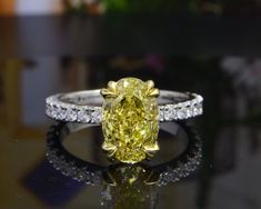 Yellow Oval Hidden Halo Engagement Ring Luxury Yellow Pear-shaped Ring, Yellow Oval Brilliant Cut Diamond Ring, Luxury Yellow Diamond Wedding Ring, Elegant Yellow Pear-shaped Diamond Ring, Yellow Diamond Ring With Vvs Clarity, Yellow Oval Diamond Ring Fine Jewelry, Yellow Oval Diamond Ring, Fine Jewelry, Dazzling Oval Yellow Ring, Dazzling Yellow Oval Ring